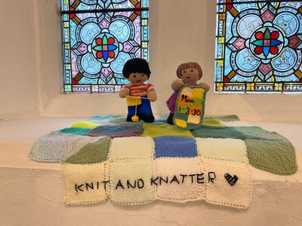 Knitted signs from Knit and Natter group